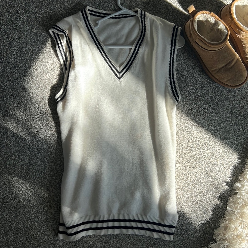 White sweater vest